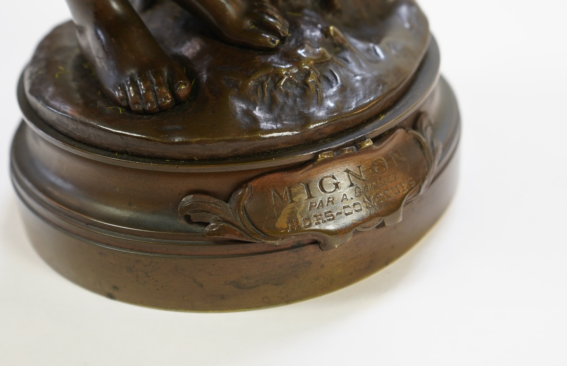 Adrien Etienne Gaudez (1845-1902), ‘Mignon’, a patinated bronze figure of peasant girl with a mandolin